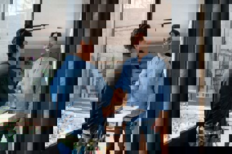 two people shaking hands